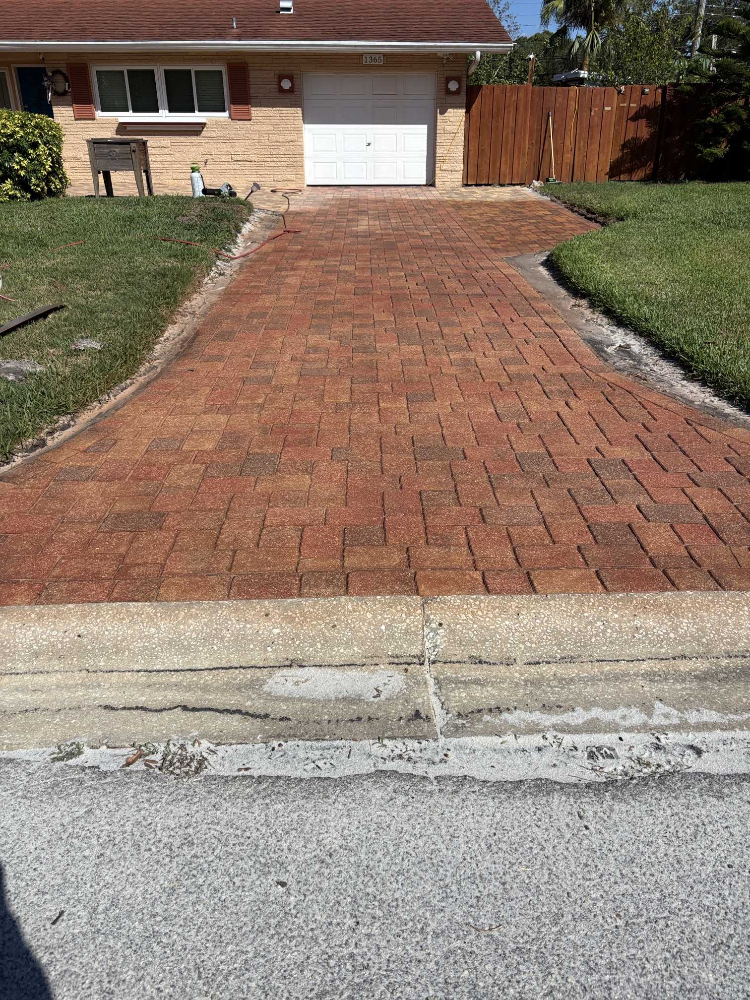 Full house view after Brick Red paver stain and paver sealing in Clearwater, FL