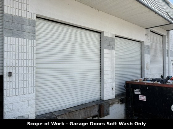 Commercial garage door cleaning at loading dock in St. Petersburg, FL