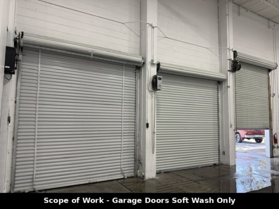 Cleaned warehouse roll-up doors at commercial property in St. Petersburg, FL