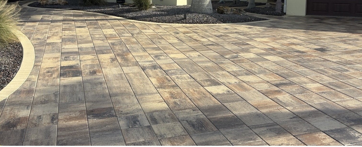 Freshly sealed paver driveway with a semi-gloss finish in Indian Rocks Beach, FL
