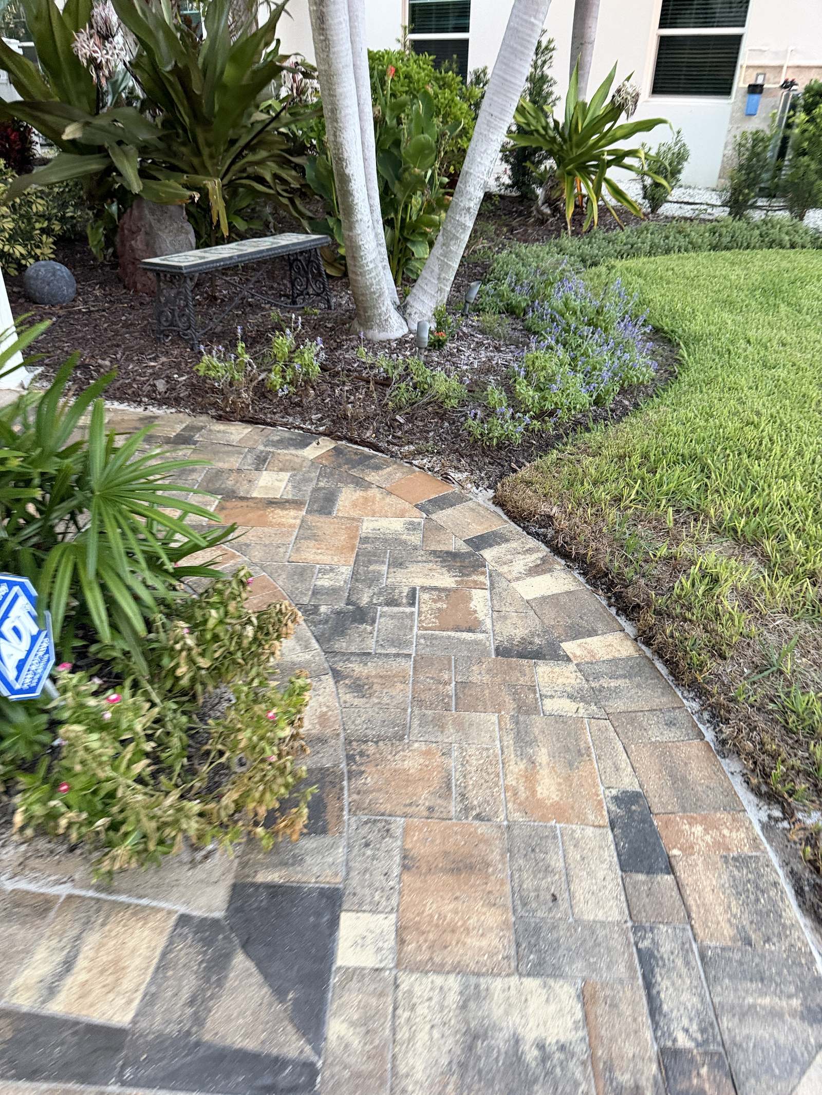 Sealed paver garden walkway in Indian Rocks Beach, FL
