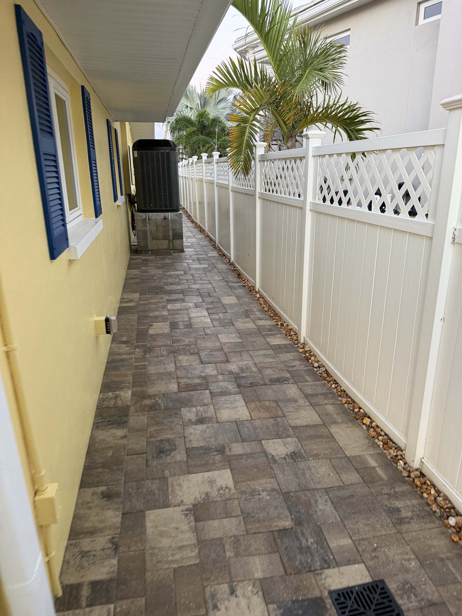Sealed paver side walkway near the AC unit in Indian Rocks Beach, FL
