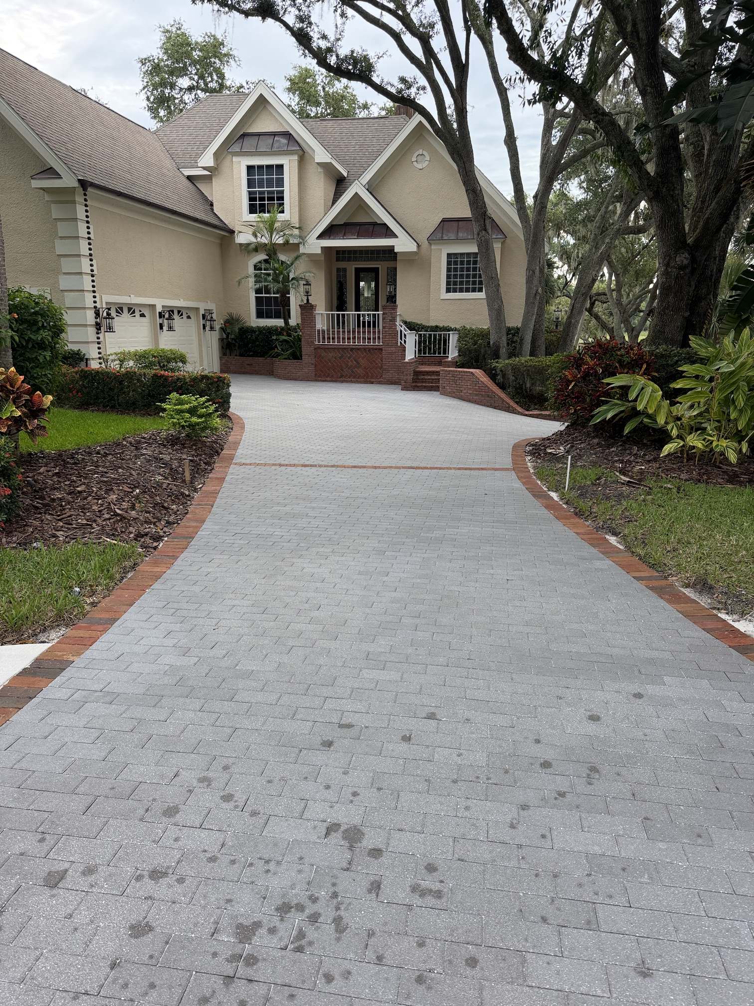 Before photo of paver driveway sealing in Palm Harbor, FL
