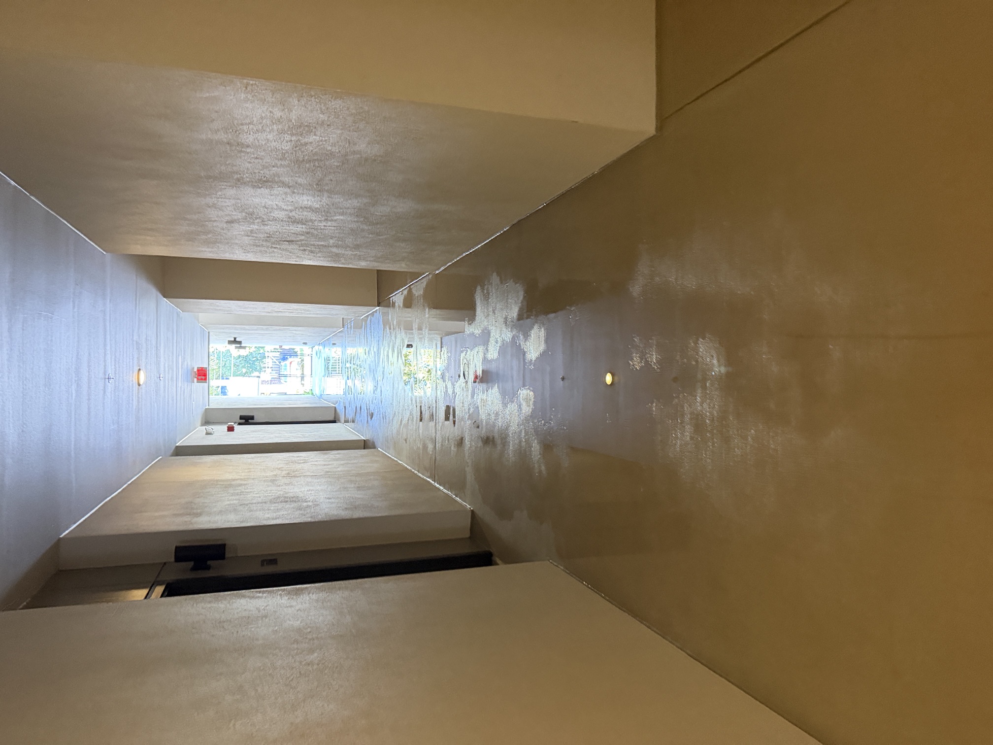 After photo of a freshly rinsed interior corridor at an apartment community in Largo, FL