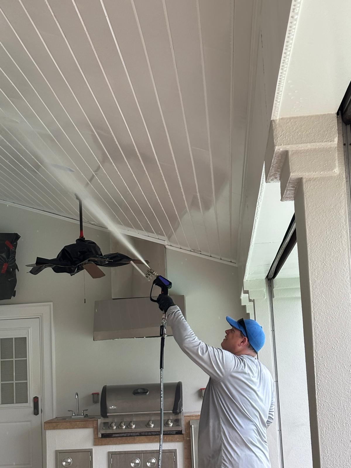 Soft washing a covered lanai ceiling and outdoor kitchen area in Belleair, FL