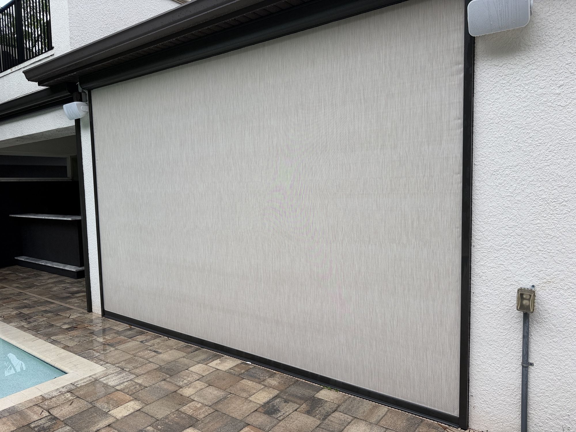 After photo of a cleaned lanai screen panel near Brandon