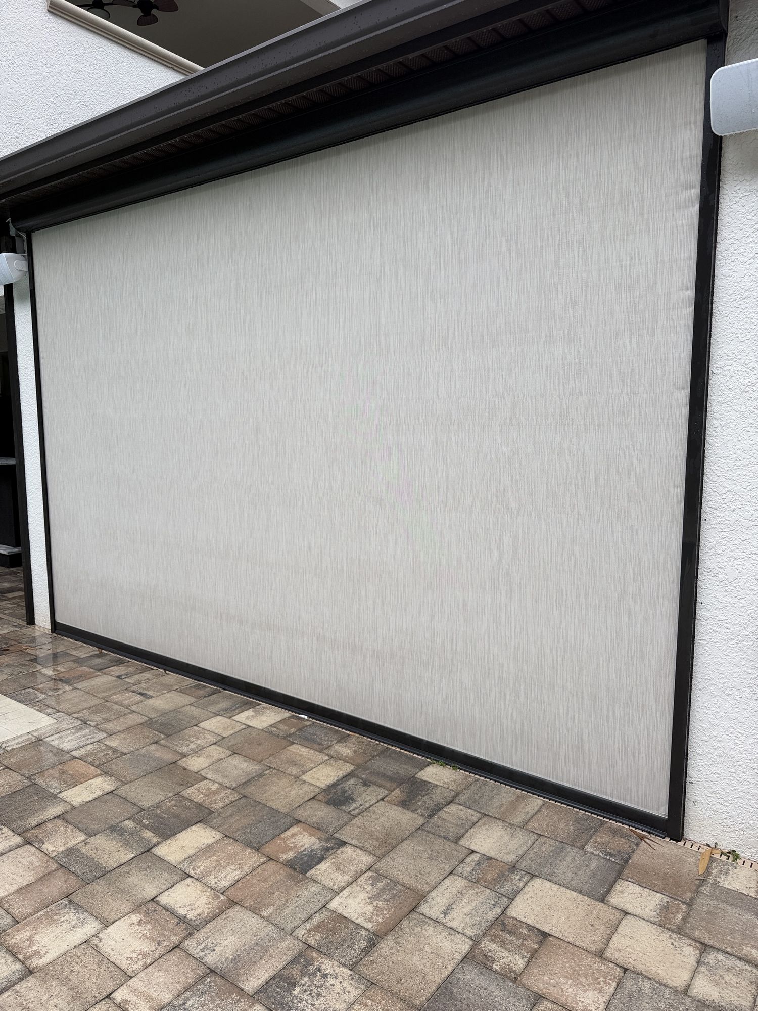 After photo of a cleaned lanai screen panel near Brandon