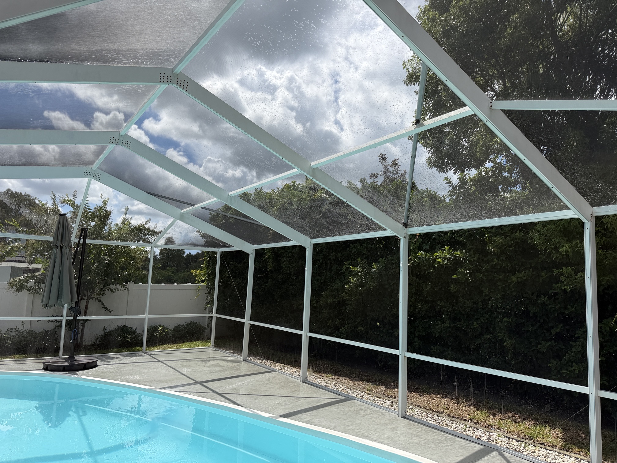 After photo of cleaned pool cage roof panels in Palm Harbor, FL