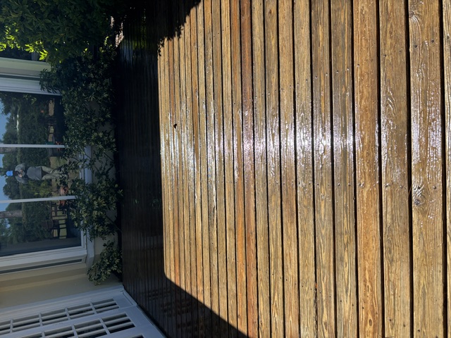After photo close-up of wood deck cleaning in Belleair, FL